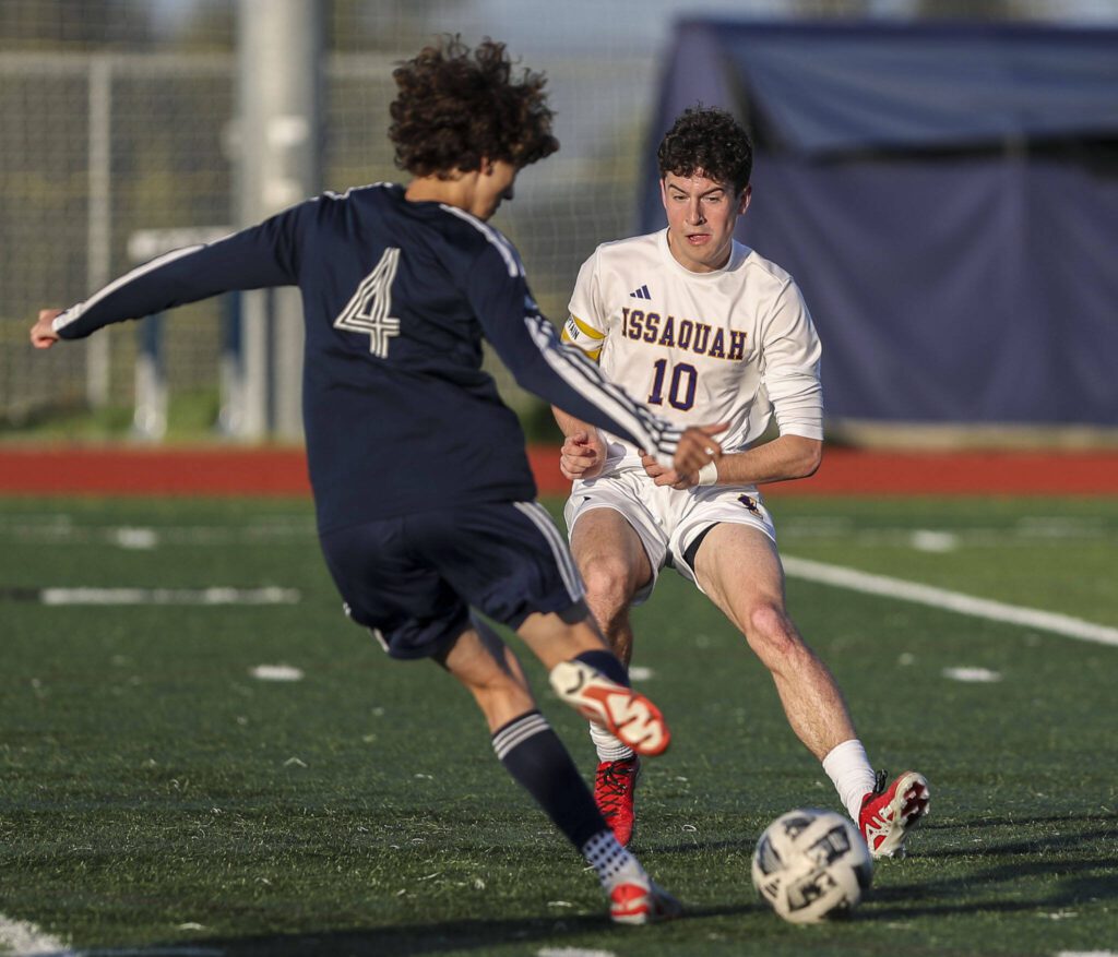 Issaquah’s Oliver Dorr (10) and Glacier Peak’s Ethan Jewett (4) fight for the ball during a Class 4A District 1/2 boys soccer game between Glacier Peak and Issaquah at Glacier Peak High School in Snohomish, Washington on Tuesday, May 7, 2024. Issaquah won, 2-1. (Annie Barker / The Herald)
