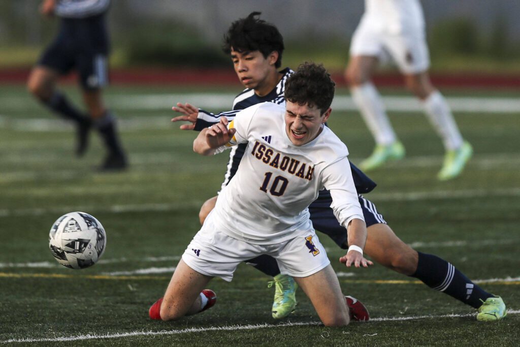 Issaquah’s Oliver Dorr (10) scrambles for the ball during a Class 4A District 1/2 boys soccer game between Glacier Peak and Issaquah at Glacier Peak High School in Snohomish, Washington on Tuesday, May 7, 2024. Issaquah won, 2-1. (Annie Barker / The Herald)

