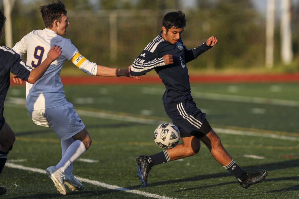Glacier Peak’s Gael Guerrero (2) kicks the ball during a Class 4A District 1/2 boys soccer game between Glacier Peak and Issaquah at Glacier Peak High School in Snohomish, Washington on Tuesday, May 7, 2024. Issaquah won, 2-1. (Annie Barker / The Herald)
