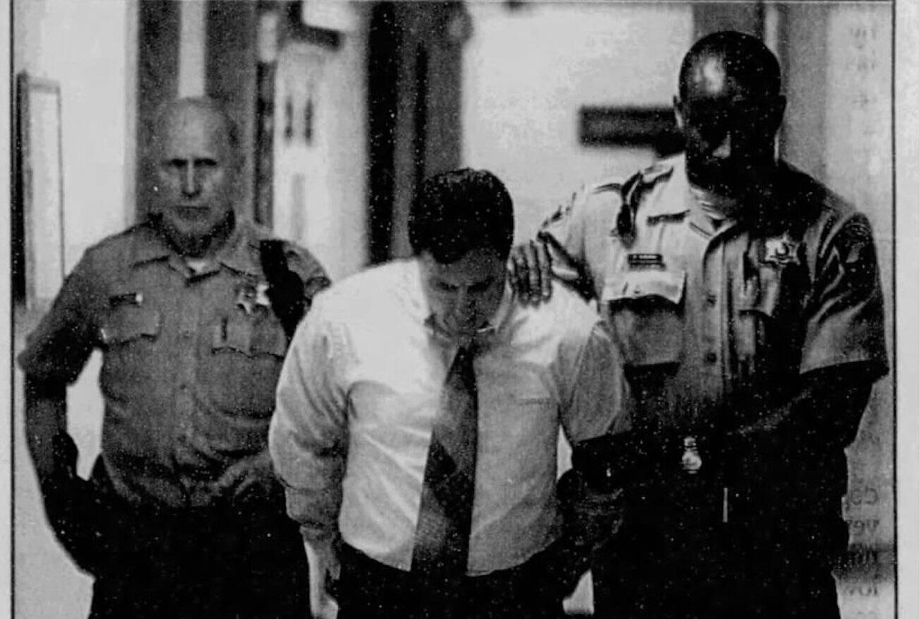 Convicted sex offender Michell Gaff is escorted into court. This photo originally appeared in The Everett Daily Herald on Aug. 15, 2000. (Justin Best / The Herald file)