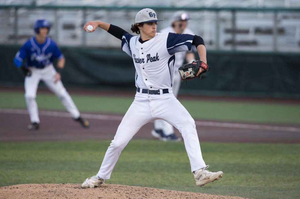 Glacier Peak’s Jake Doman pitches during the 4A district game against Bothell at Funko Field on Thursday, May 9, 2024 in Everett, Washington. (Olivia Vanni / The Herald)
