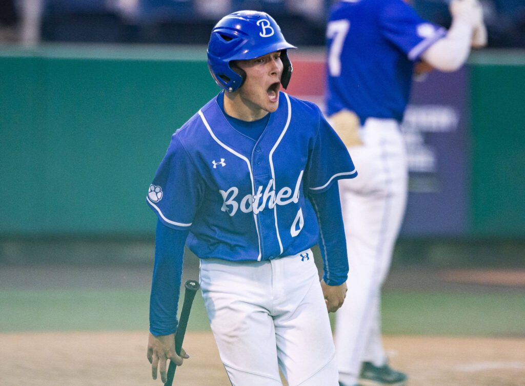 Bothell’s Henry Crumbaugh reacts to scoring a run during the 4A district game against Glacier Peak at Funko Field on Thursday, May 9, 2024 in Everett, Washington. (Olivia Vanni / The Herald)
