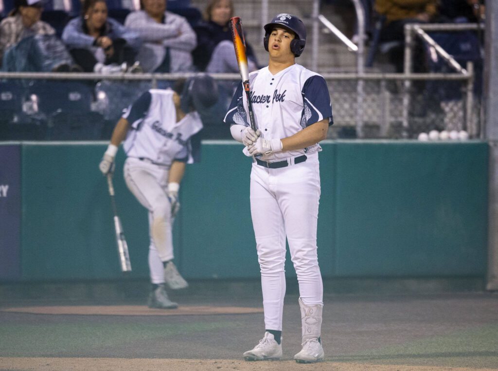 Glacier Peak’s Emmett Brown takes a deep breath before stepping up to the plate during the final inning of the 4A district game against Bothell at Funko Field on Thursday, May 9, 2024 in Everett, Washington. (Olivia Vanni / The Herald)
