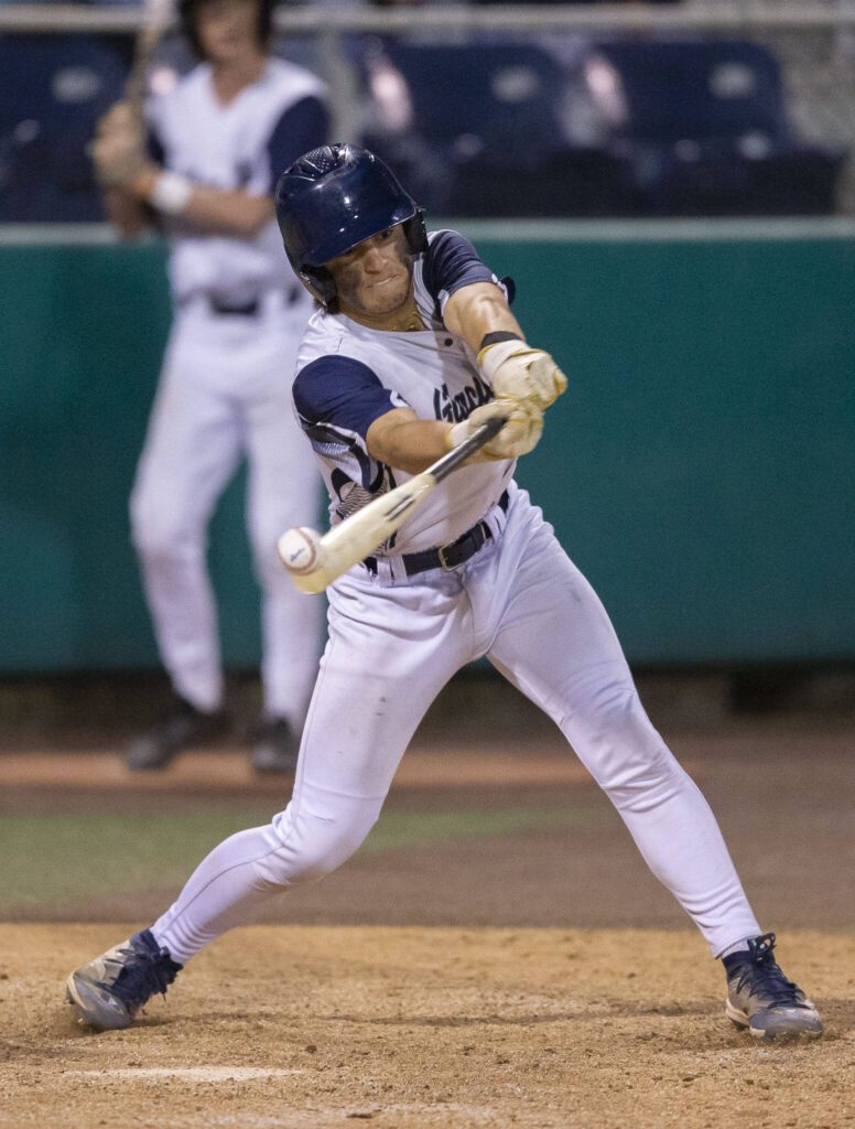 Glacier Peak’s Lucas Entler tips the ball while at bat during the 4A district game against Bothell at Funko Field on Thursday, May 9, 2024 in Everett, Washington. (Olivia Vanni / The Herald)
