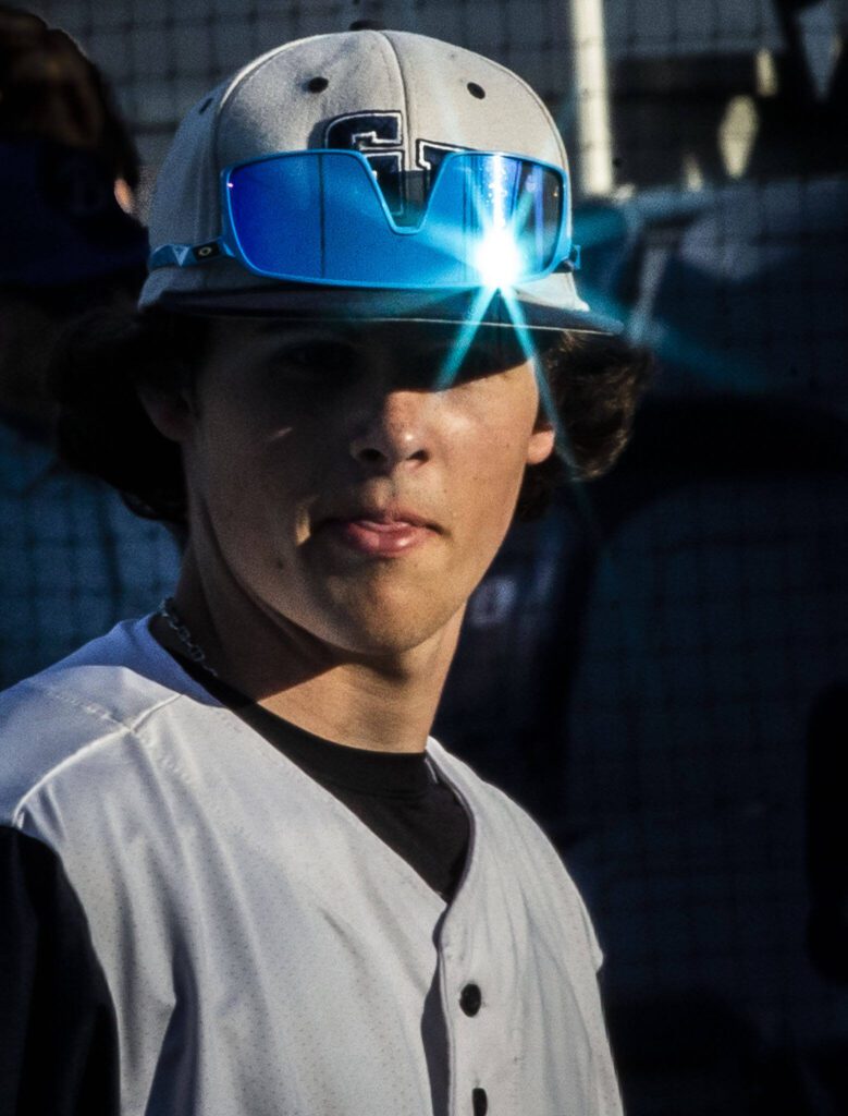 The sun reflects off of a Glacier Peak players sunglasses during the 4A district game against Bothell at Funko Field on Thursday, May 9, 2024 in Everett, Washington. (Olivia Vanni / The Herald)
