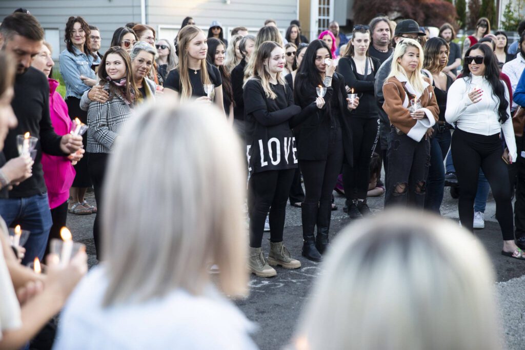 Family and friends of Liliya Guyvoronsky become emotional while openly speaking positive words describing Lily during a vigil held outside her home on Tuesday, May 14, 2024 in Seattle, Washington. (Olivia Vanni / The Herald)
