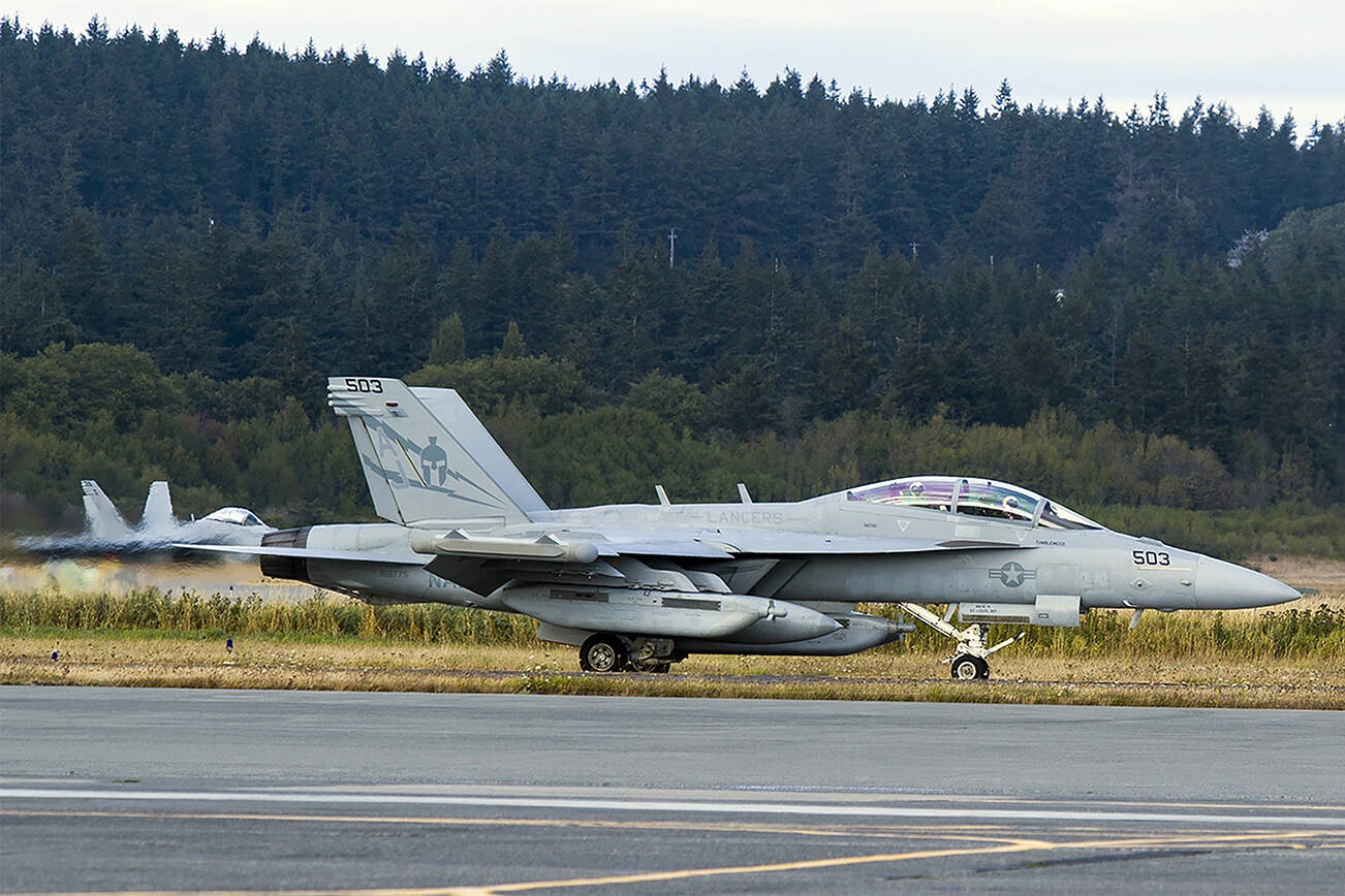 An EA-18G Growler taxis down the airstrip on Naval Air Station Whidbey Island during the squadron’s welcome home ceremony in August 2017. (Mass Communication Specialist 2nd Class Scott Wood/U.S. Navy)