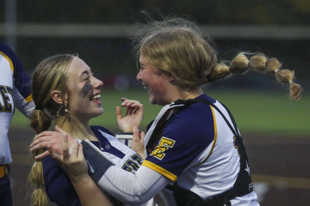 Everett players celebrate during a Class 3A District 1 softball championship game between Snohomish and Everett at Phil Johnson Fields in Everett, Washington on Thursday, May 16, 2024. Everett won, 10-0. (Annie Barker / The Herald)
