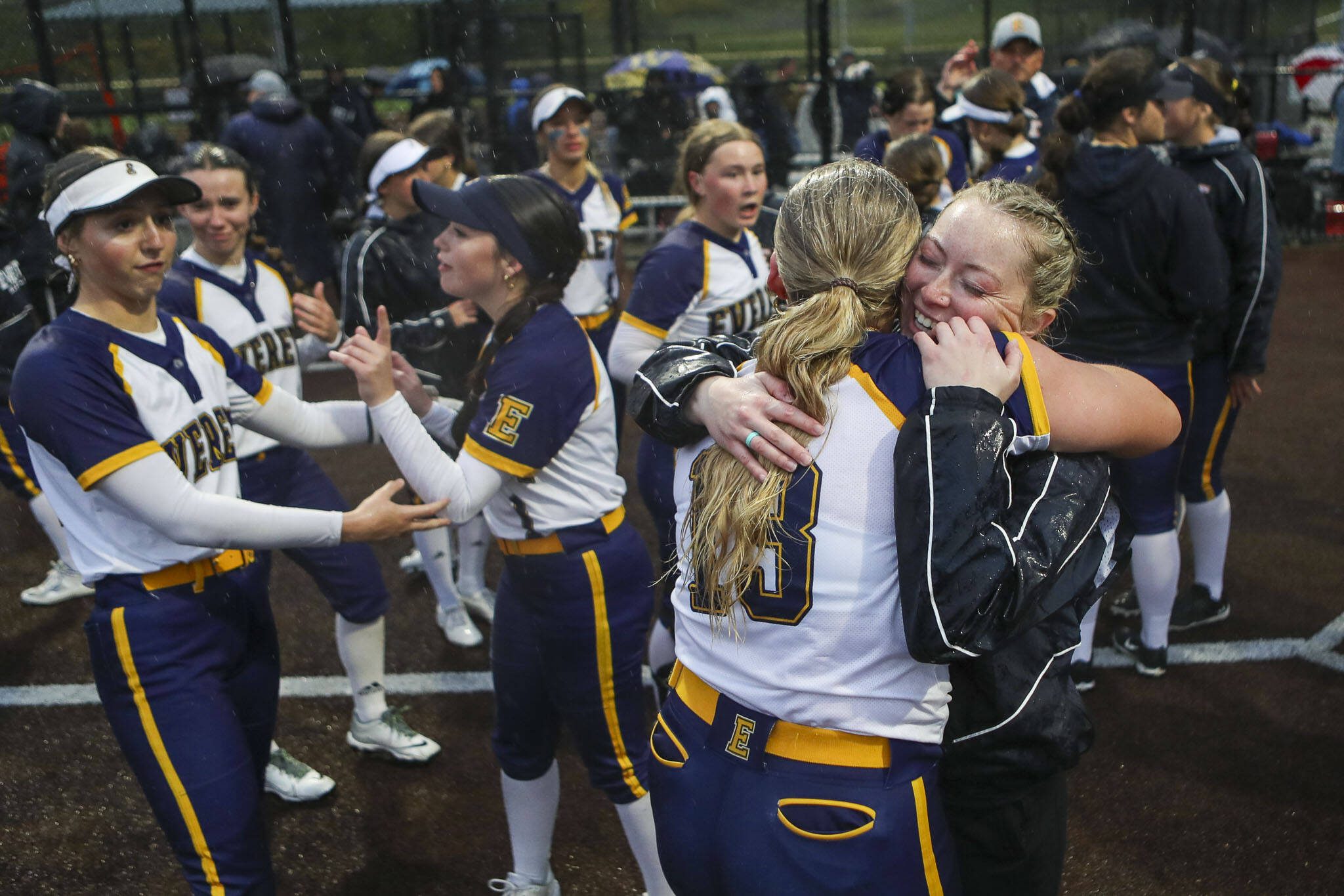 Everett players celebrate during a Class 3A District 1 softball championship game between Snohomish and Everett at Phil Johnson Fields in Everett, Washington on Thursday, May 16, 2024. Everett won, 10-0. (Annie Barker / The Herald)