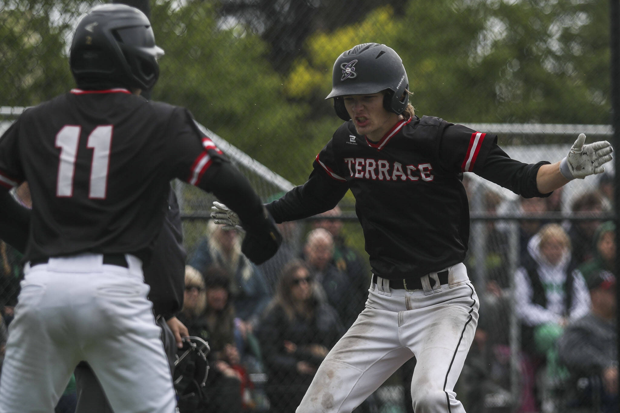 Mountlake Terrace players react to a run during a baseball game between Mountlake Terrace and Bishop Blanchet at Edmonds-Woodway High School in Edmonds, Washington on Saturday, May 18, 2024. Mountlake Terrace won, 12-7.(Annie Barker / The Herald)