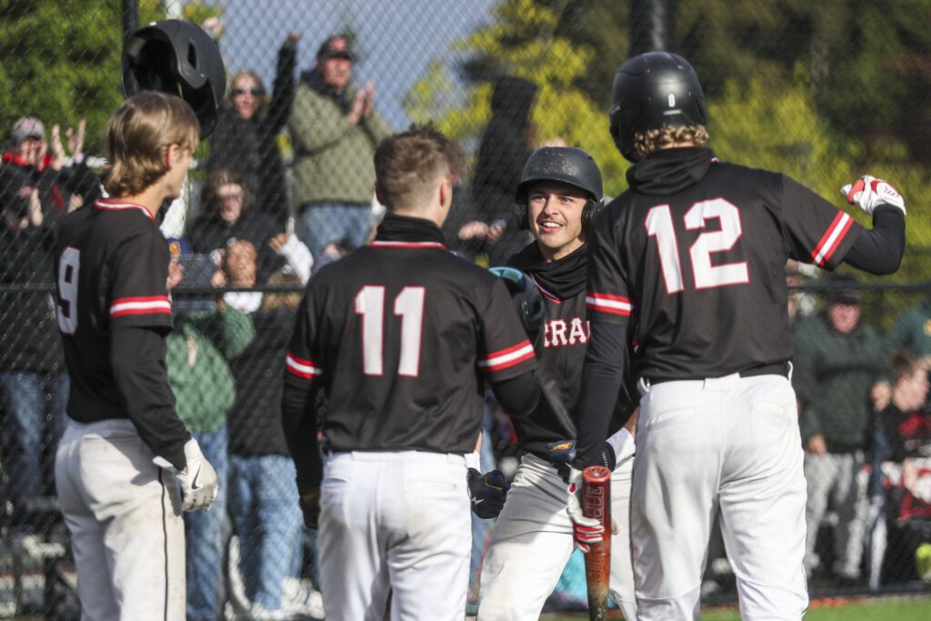 Mountlake Terrace players celebrate a home run during a baseball game between Mountlake Terrace and West Seattle at Edmonds-Woodway High School in Edmonds, Washington on Saturday, May 18, 2024. Mountlake Terrace lost, 9-10.(Annie Barker / The Herald)
