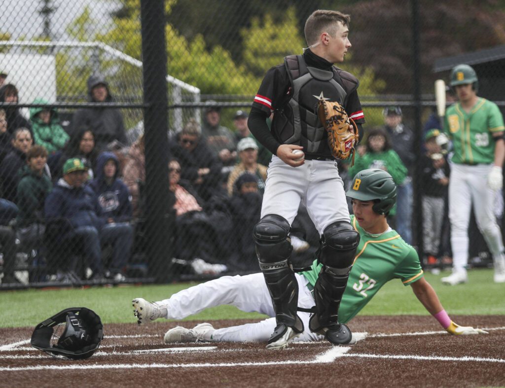 Bishop Blanchet’s (32) is deemed out during a baseball game between Mountlake Terrace and Bishop Blanchet at Edmonds-Woodway High School in Edmonds, Washington on Saturday, May 18, 2024. Mountlake Terrace won, 12-7.(Annie Barker / The Herald)
