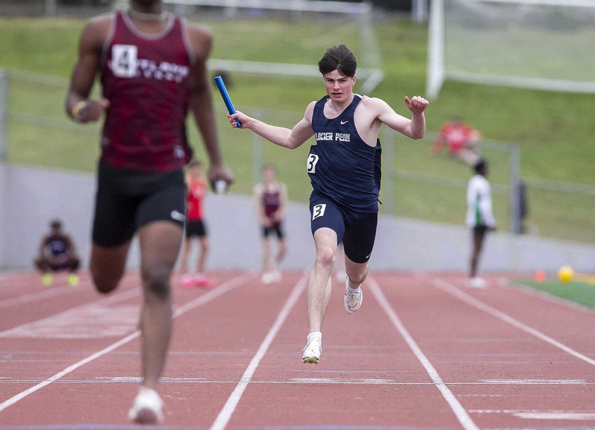 Glacier Peak’s Mateo Ganje crosses the finish line in the Boys 4x100 during the Eason Invitational at Snohomish High School on Saturday, April 20, 2024 in Snohomish, Washington. (Olivia Vanni / The Herald)