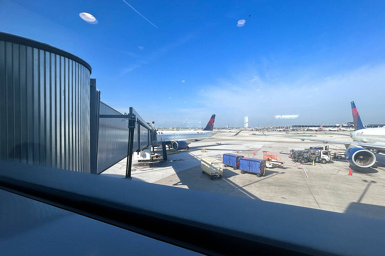 An airplane is parked at Gate M9 on Tuesday, May 21, 2024 at OHare International Airport in Chicago, Illinois. (Jordan Hansen/The Herald)