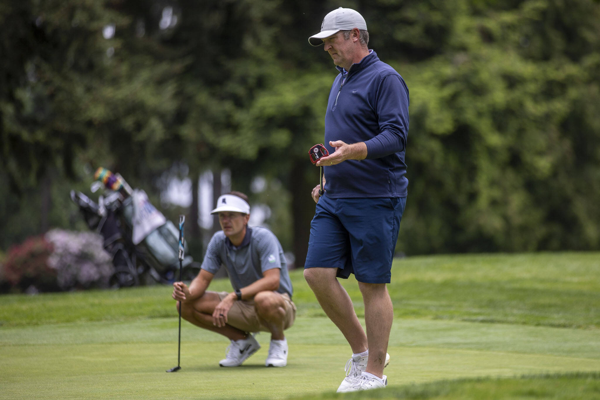 Jacob Rohde surveys the area at Everett Golf & Country Club during last year’s final round of the Snohomish County Amateur golf tournament. The three-time champion is among this year’s favorites. (Annie Barker / The Herald)