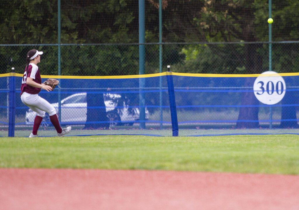 Cascade’s Sophia Tripp watches the ball goes over the back net for a home run during the 3A state softball tournament game against Gig Harbor on Thursday, May 23, 2024 in Lacey, Washington. (Olivia Vanni / The Herald)
