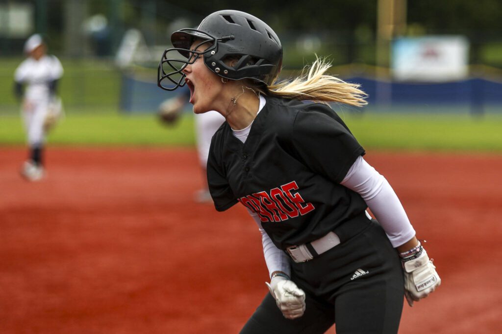 Monroe’s Izzy Webster (14) reacts during a 3A softball game between Monroe and Auburn Riverside at the regional athletic complex in Lacey, Washington on Friday, May 24, 2024. Monroe fell, 18-4. (Annie Barker / The Herald)
