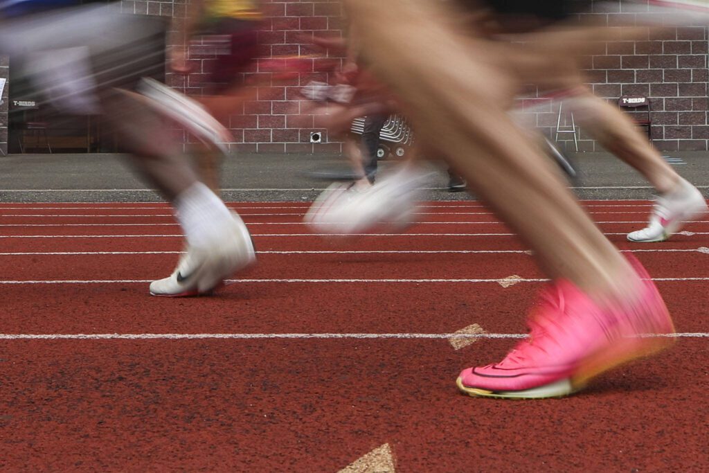 Runners race during the Class 4A, 3A, 2A track and field state championships at Mount Tahoma High School in Tacoma, Washington on Saturday, May 25, 2024. (Annie Barker / The Herald)
