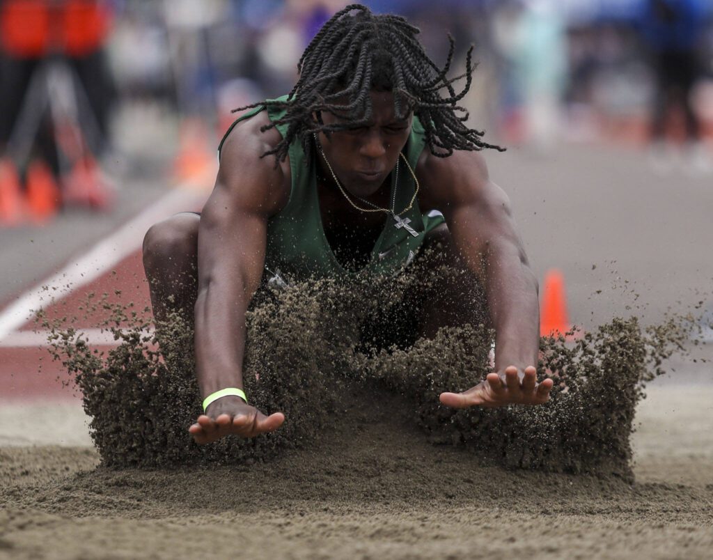 Marysville Getchell’s Shawn Etheridge participates in the Boys 3A long jump during the Class 4A, 3A, 2A track and field state championships at Mount Tahoma High School in Tacoma, Washington on Saturday, May 25, 2024. (Annie Barker / The Herald)
