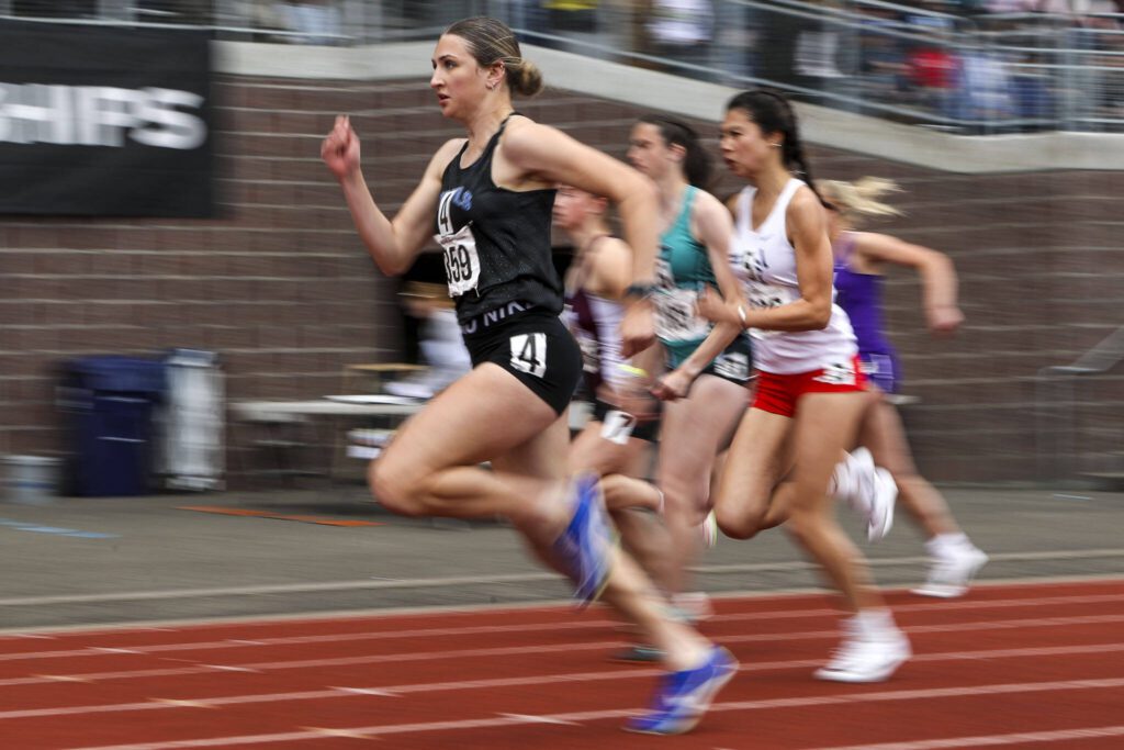 Runners participate in the Girls 100M dash during the Class 4A, 3A, 2A track and field state championships at Mount Tahoma High School in Tacoma, Washington on Saturday, May 25, 2024. (Annie Barker / The Herald)

