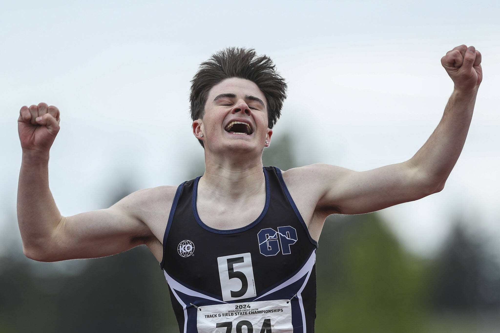 Glacier Peak’s Mateo Ganje wins the Boys 200M 4A dash during the Class 4A, 3A, 2A track and field state championships at Mount Tahoma High School in Tacoma, Washington on Saturday, May 25, 2024. (Annie Barker / The Herald)