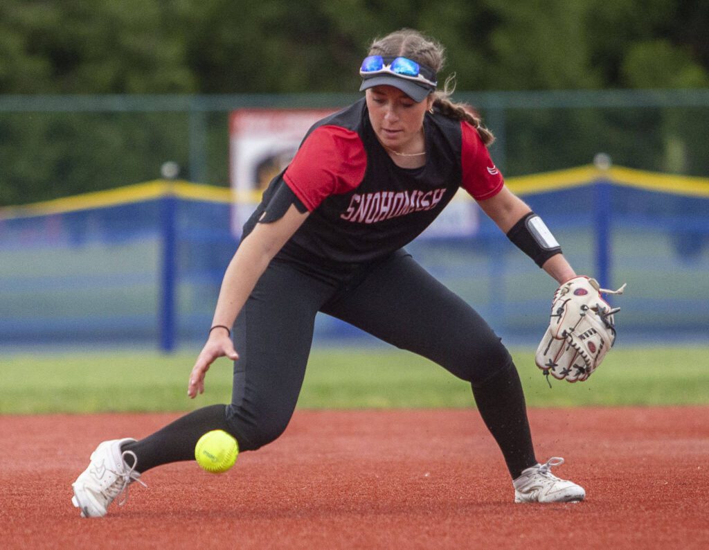 Snohomish’s Camryn Sage fields the ball during the 3A state softball championship game against Auburn Riverside on Saturday, May 25, 2024 in Lacey, Washington. (Olivia Vanni / The Herald)
