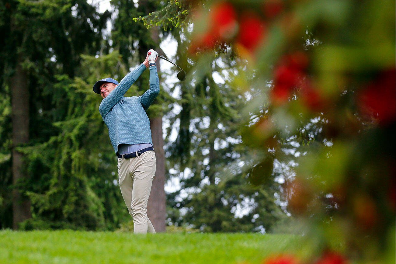 Champion Johnny Carey tees off during the 93rd Annual Snohomish County Amateur Championship on Monday, May 27, 2024, at the Everett Golf and Country Club in Everett, Washington. (Ryan Berry / The Herald)