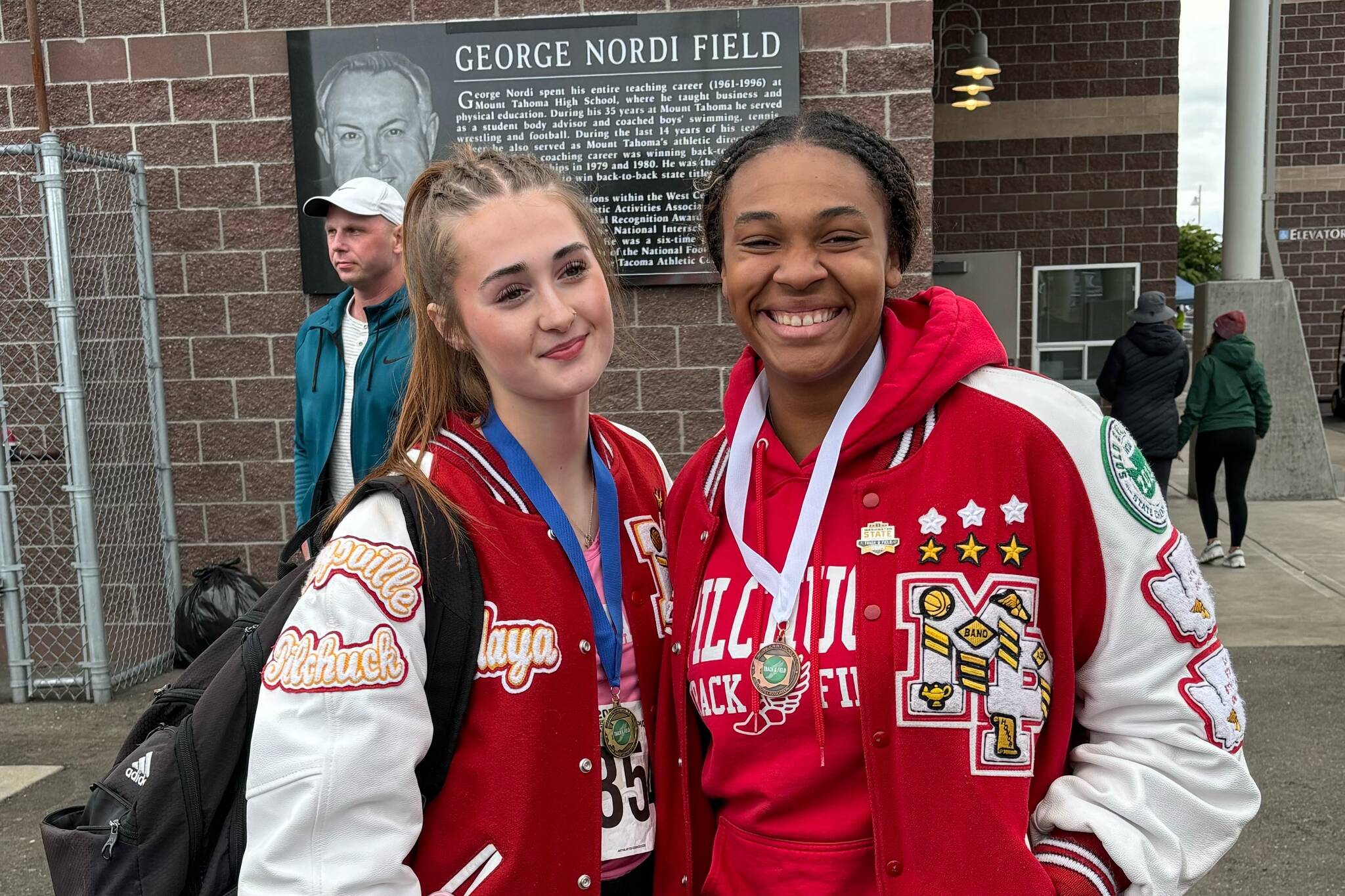 Marysville Pilchuck’s Maya Velasquez (left) poses with teammate Gianna Frank after winning the Class 3A state girls high jump. (Photo courtesy of Kris Jensen)