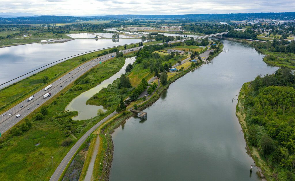 Langus Riverfront Park in Everett stretches along the Snohomish River just west of I-5 (left). This view is looking south. (Chuck Taylor / The Herald) 
