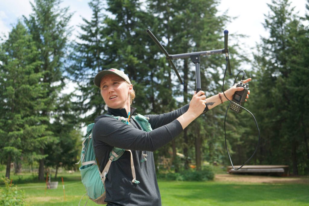 Anna Machowicz, education director and co-founder for the nonprofit Home Range, instructs a lesson in radio telemetry June, 2023 in Mazama, Washington. (So Sinopoulos-Lloyd)
