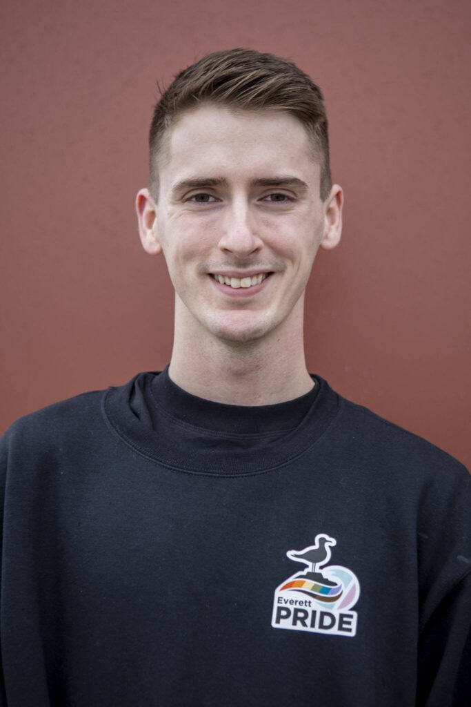 Everett Pride board member Bryce Laake poses for a photo at South Fork Bakery in Everett, Washington on Sunday, May 26, 2024. (Annie Barker / The Herald)
