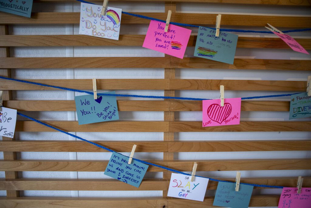 Positive notes are displayed inside the Mobile Art Center during the Stanwood-Camano Pride event at Freedom Park in Camano, Washington on Saturday, June 1, 2024. (Annie Barker / The Herald)
