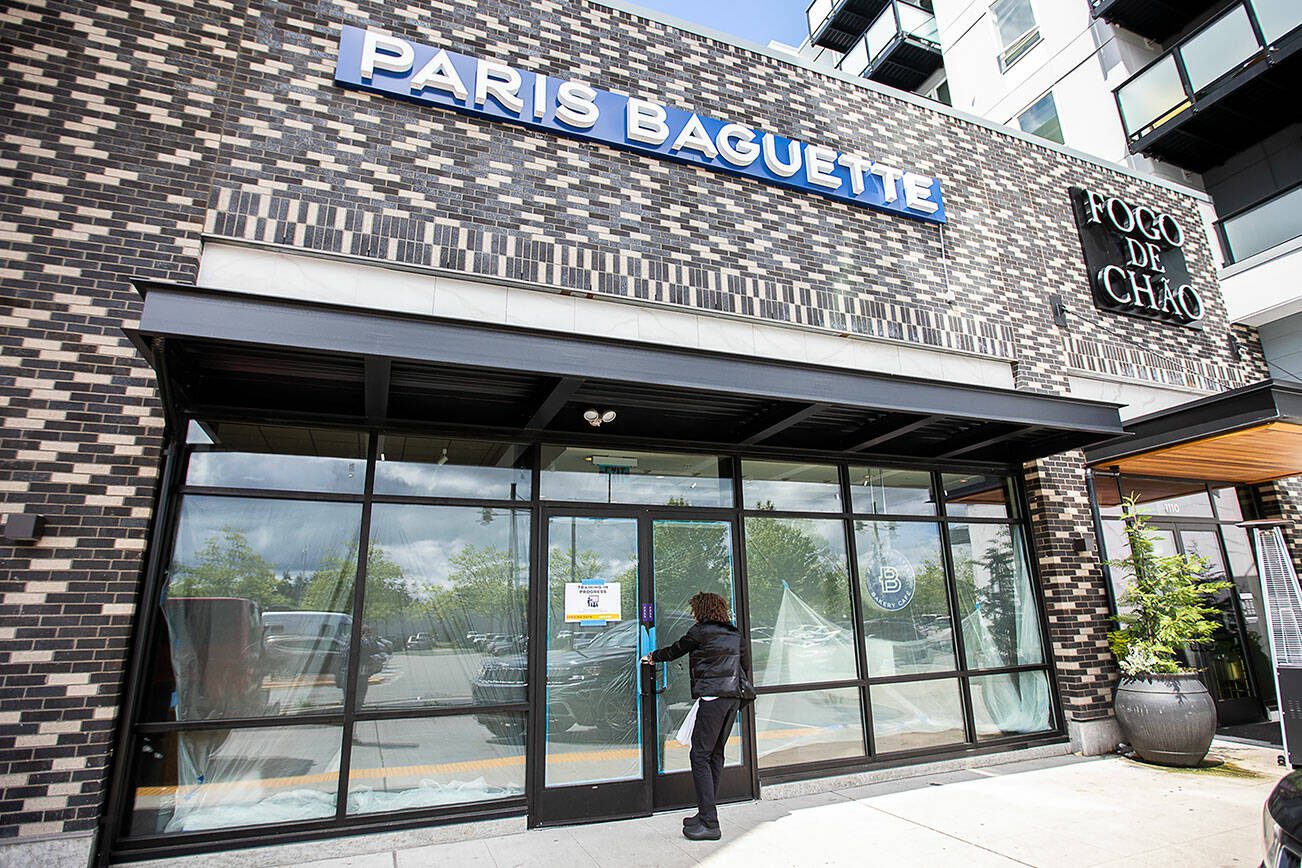 A person walks into Paris Baguette next to the Alderwood Mall on Thursday, May 30, 2024 in Lynnwood, Washington. This is the first Paris Baguette location to open in Washington. (Olivia Vanni / The Herald)