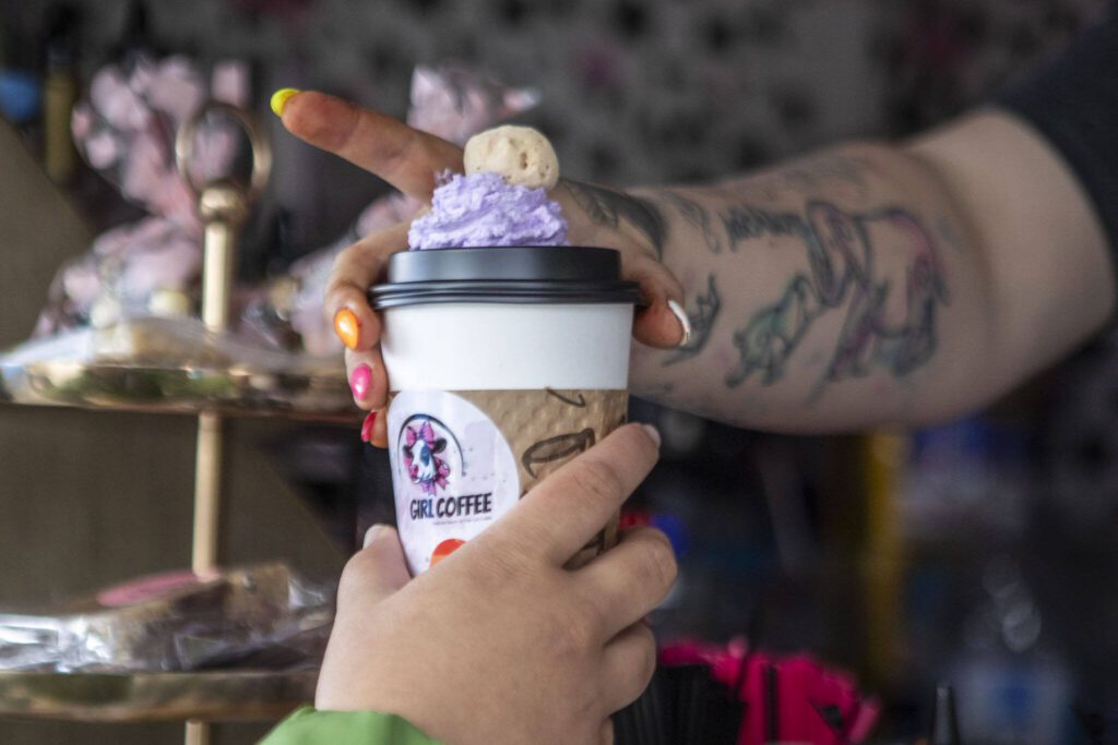 Melinda Grenier serves patrons at her coffee truck called Hay Girl Coffee during the third annual Arlington Pride event in Arlington, Washington on Sunday, June 2, 2024. (Annie Barker / The Herald)
