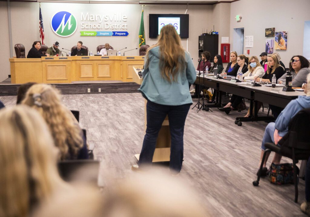 Members of the school board listen while Christine Cobb speaks during a Marysville School Board meeting on Monday, June 3, 2024 in Marysville, Washington. (Olivia Vanni / The Herald)
