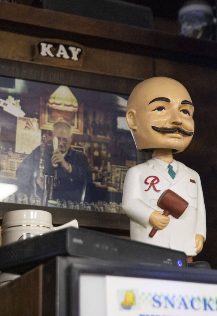 A Rainier bobblehead resembling the former owner Kay Kuhnle sits on display at Kuhnle’s Tavern on June 17, 2024 in Marysville. (Olivia Vanni / The Herald)
