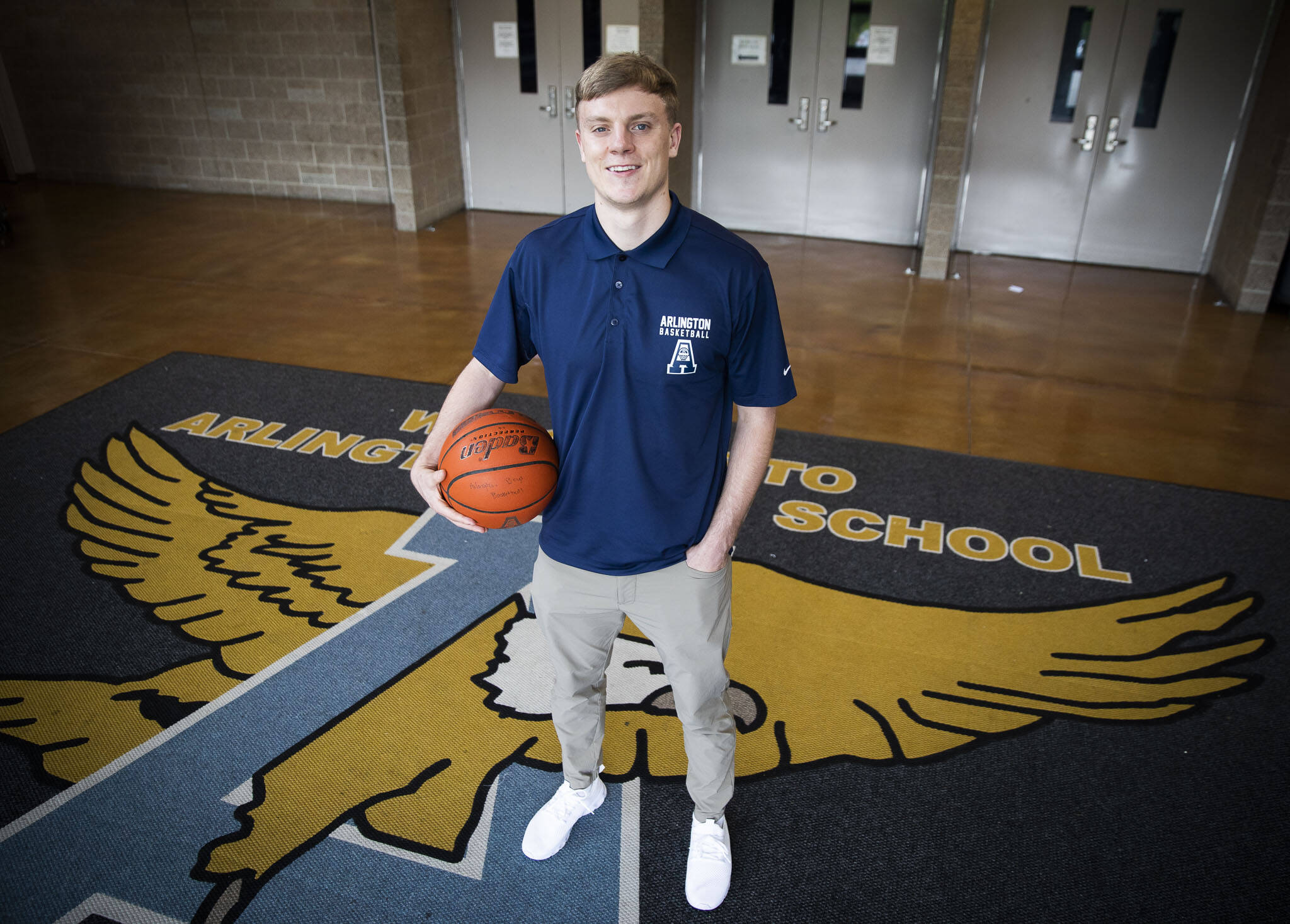 Drew Bryson, the new Arlington boys basketball head coach, at Arlington High School on Tuesday, June 11, 2024. (Olivia Vanni / The Herald)