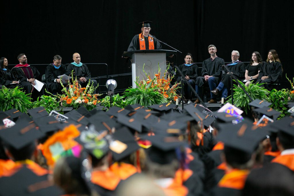 Tyler Blackburn, chosen by his class to speak, delivers an address during Monroe High School’s 2024 commencement on Wednesday, June 12, 2024, at Angel of the Winds Arena in Everett, Washington. (Ryan Berry / The Herald)
