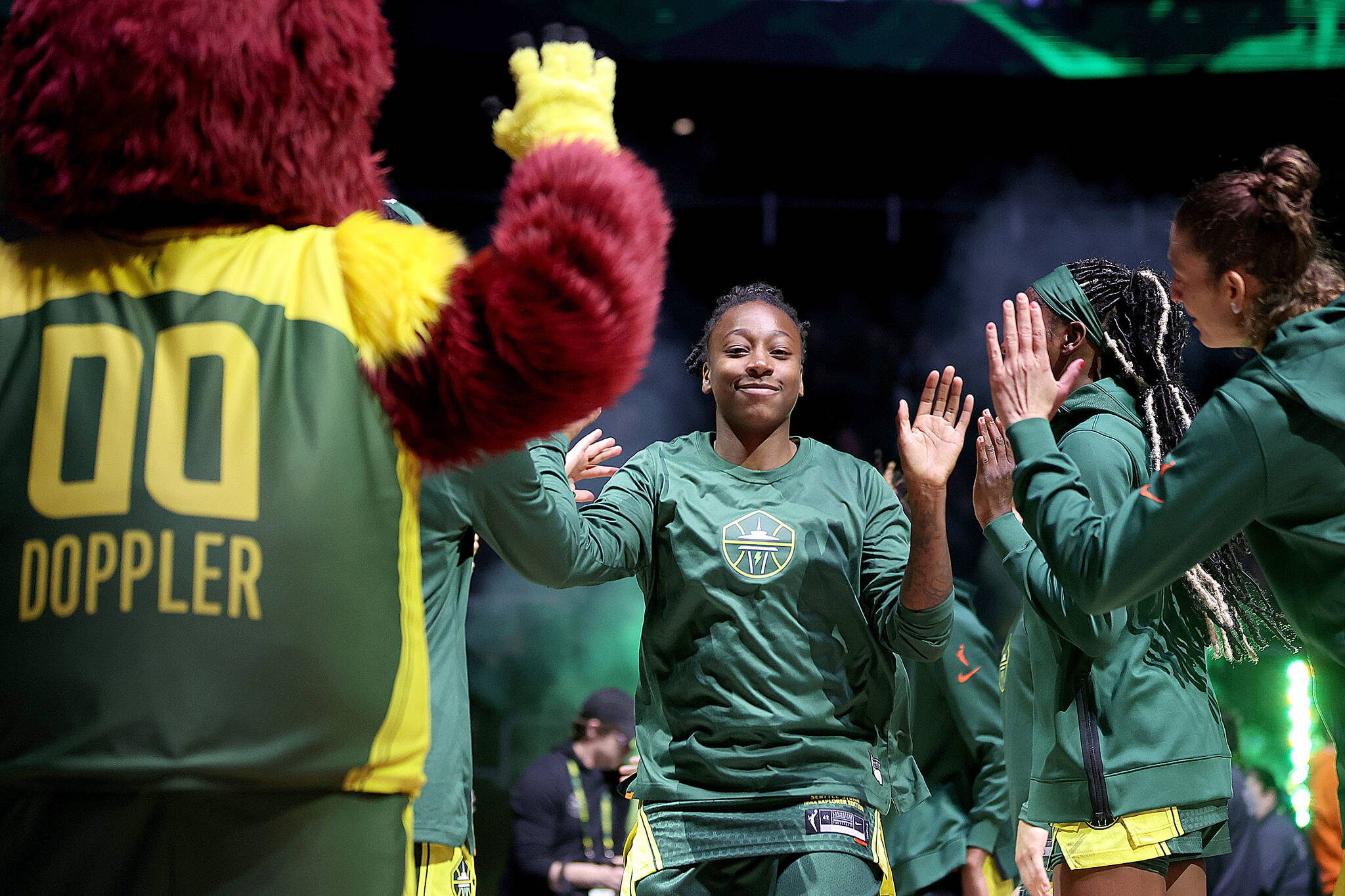 Jewell Loyd (24) of the Seattle Storm is introduced before a game against the Phoenix Mercury on May 8 in Seattle. (Steph Chambers / Getty Images, file)