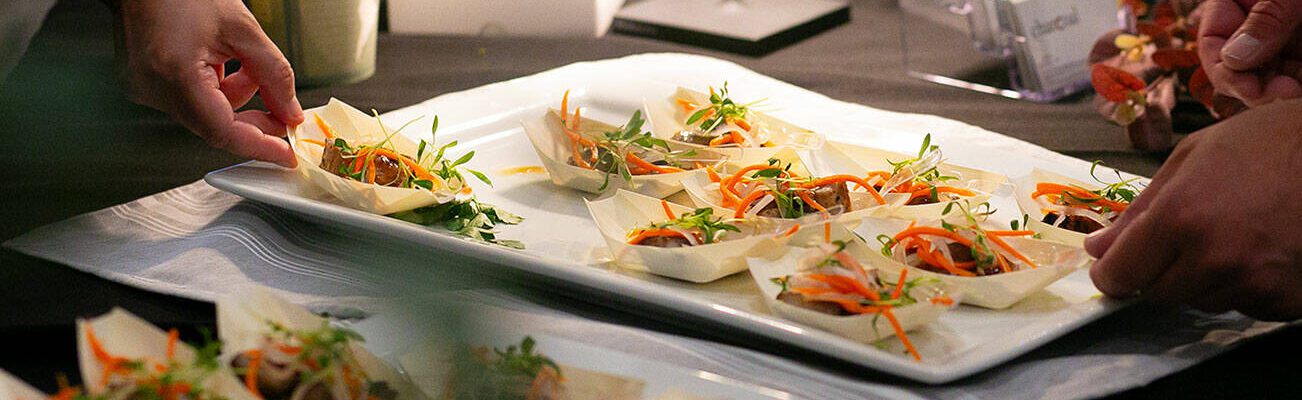 Charcoal’s grilled pork belly with fish sauce caramel, pickled carrot and daikon slaw steals the show at Crave! Northwest food festival at the Lynnwood Event Center on Friday, June 21, 2024, in Lynnwood, Washington. (Ryan Berry / The Herald)
