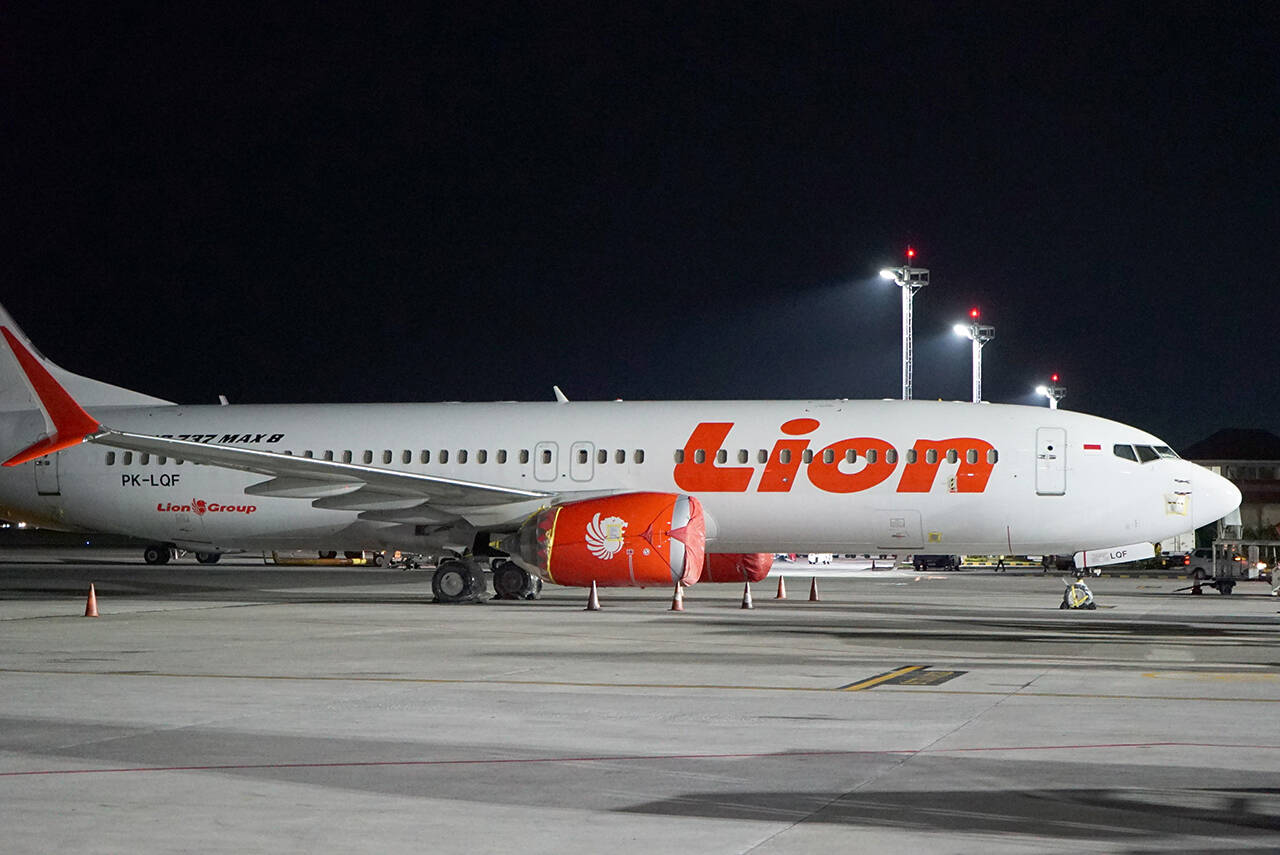 A Lion Air Boeing 737 Max 8 sits on the tarmac at Ngurah Rai International Airport in Bali, Indonesia, April 13, 2019. Indonesia said Dec. 29, 2021, it is lifting its ban on Boeing’s 737 Max aircraft, three years after one crashed shortly after takeoff, killing all 189 people on board. (Nicole Evatt / Associated Press file photo)