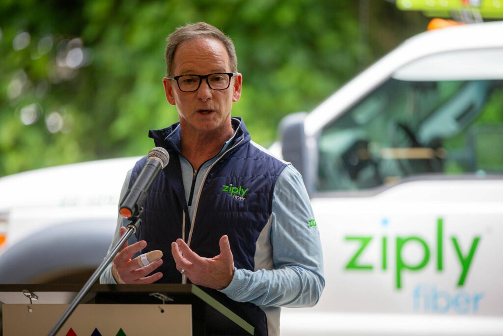 Ziply Fiber Chief Marketing Officer Mike Doherty speaks during a press conference and groundbreaking for the SR 530 Broadband Project on Wednesday, June 26, 2024, at Darrington Fire District Station 38 outside Darrington, Washington. (Ryan Berry / The Herald)
