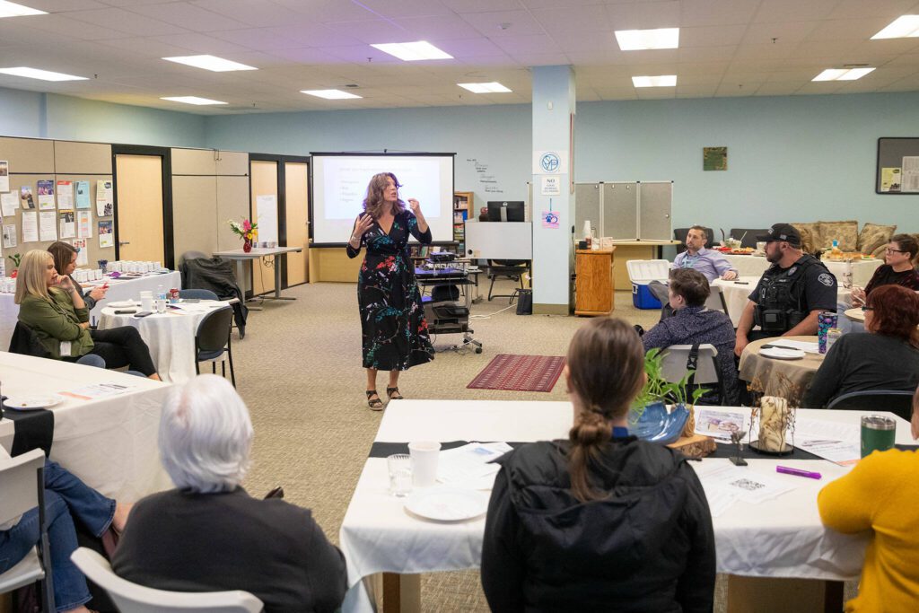 Tedra Cobb, of the Medicine Recover Center of Excellence in New York, leads a community conversation about opioid use disorder on Thursday, June 27, 2024, at the St. Vincent DePaul Resource Center in Monroe, Washington. (Ryan Berry / The Herald)

