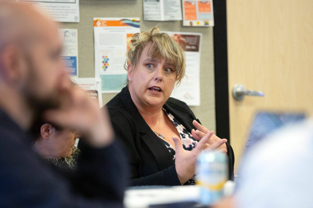 Ideal Option’s April Provost helps guide a discussion during a community conversation about opioid use disorder on Thursday, June 27, 2024, at the St. Vincent DePaul Resource Center in Monroe, Washington. (Ryan Berry / The Herald)
