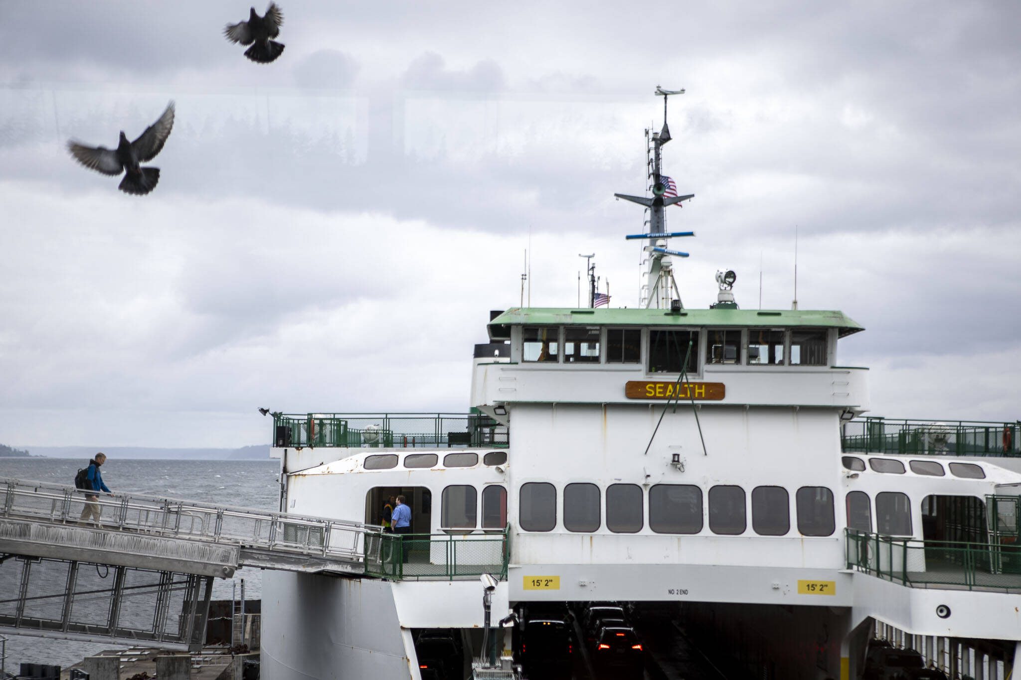 People board the Mukilteo ferry in Mukilteo, Washington on Monday, June 3, 2024. (Annie Barker / The Herald)