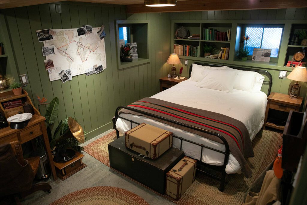 A basement bedroom at Ferry Cove is themed like an old-timey jungle cruise on May 29, 2024, in Clinton. (Ryan Berry / The Herald)
