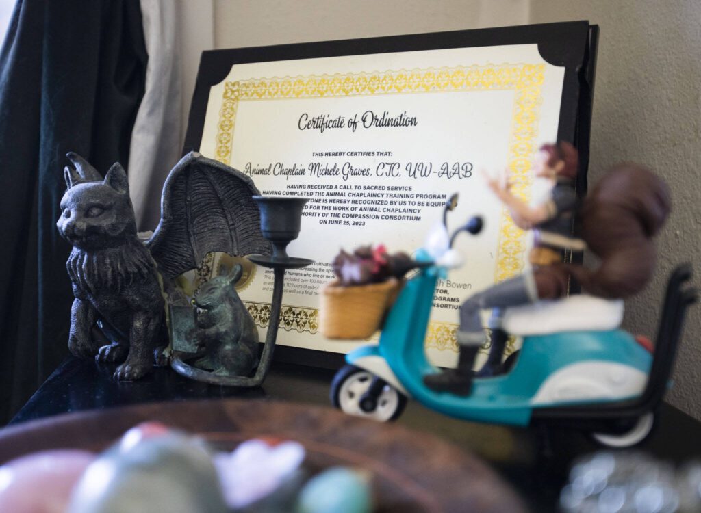 A certificate of ordination to be an animal chaplain on display on July 9, 2024 in Everett. (Olivia Vanni / The Herald)
