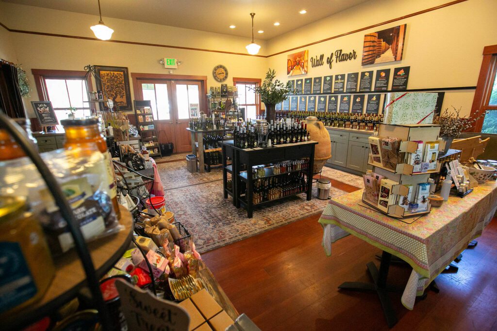 The interior of A Bit of Taste is packed with oils, vinegars and other goods on Wednesday, June 12, 2024, in Snohomish, Washington. (Ryan Berry / The Herald)
