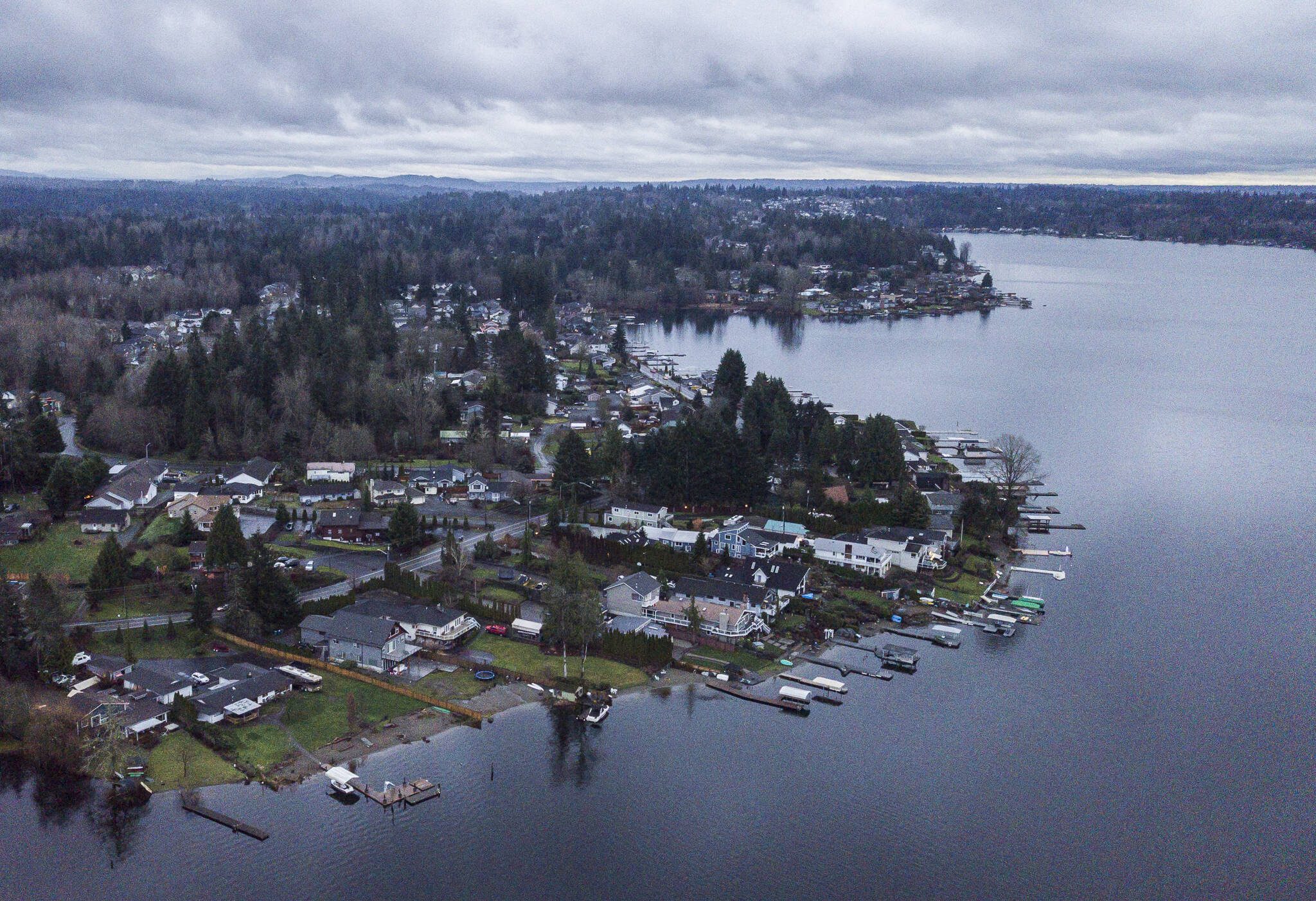 A view of the eastern lakeshore of Lake Stevens on Dec. 31, 2020, in Lake Stevens, Washington. (Olivia Vanni / The Herald)