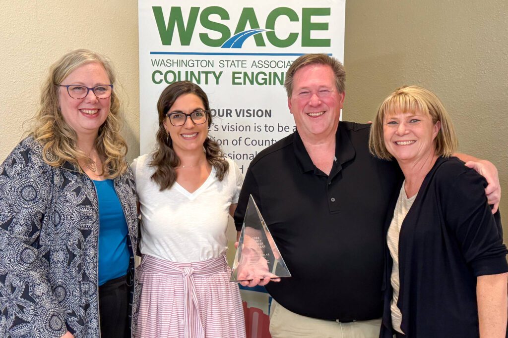 Doug McCormick, Snohomish County’s Public Works deputy director and county engineer, holds an award during the annual conference of the Washington State Association of County Engineers. (Contributed by Snohomish County)
